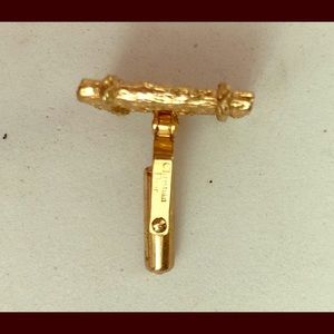 This is a Christian Dior antique cufflink. Used